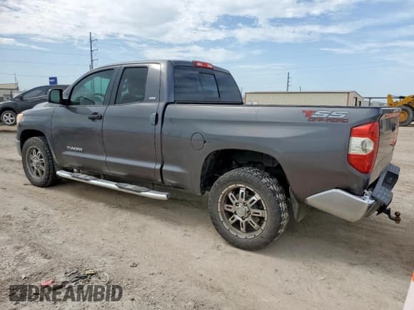 ✅ 2015 Toyota Tundra SR • VIN: 5TFRM5F15FX094689 • Lot: 65120135. Listed on Copart with 115,542 mi. Free auction sales archive from the USA and detailed vehicle history report at DreamBid. Image 2.