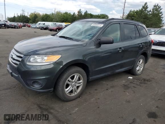 ✅ 2012 Hyundai Santa Fe GLS • VIN: 5XYZGDAB9CG107959 • Lot: 65865914. Listed on Copart with 147,889 mi. Free auction sales archive from the USA and detailed vehicle history report at DreamBid. Image 1.