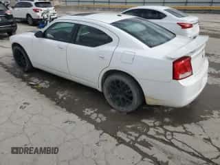 2009 Dodge Charger SXT с VIN 2B3KA33V69H576152, выставлен на аукционе Copart как лот 82020014 с пробегом 129 304 миль миль и Списание • Salvage title. История ставок и продаж доступна на DreamBid. Изображение 2.