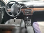 ✅ 2006 Chrysler Sebring • VIN: 1C3EL66R86N154249 • Лот: 87521385. Опубликован ранее на Copart с пробегом 163 835 миль. Бесплатный доступ к архиву аукционных продаж из США и подробный отчёт об истории автомобиля на DreamBid. Изображение 8.