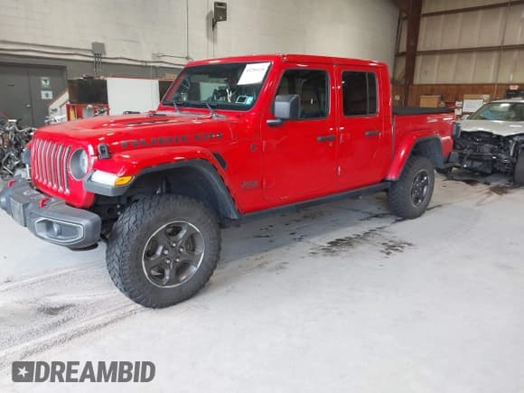 ✅ 2020 Jeep Gladiator Rubicon • VIN: 1C6JJTBG3LL125775 • Lot: 43206424. Listed on IAAI with 161,062 mi. Free auction sales archive from the USA and detailed vehicle history report at DreamBid. Image 2.