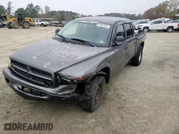 ✅ 2004 Dodge Dakota SLT • VIN: 1D7HG48N54S721985 • Lot: 81487634. Wystawiony na Copart z przebiegiem 228 354 mil. Bezpłatny archiwum sprzedaży aukcyjnych z USA i szczegółowy raport historii pojazdu na DreamBid. Zdjęcie 11.