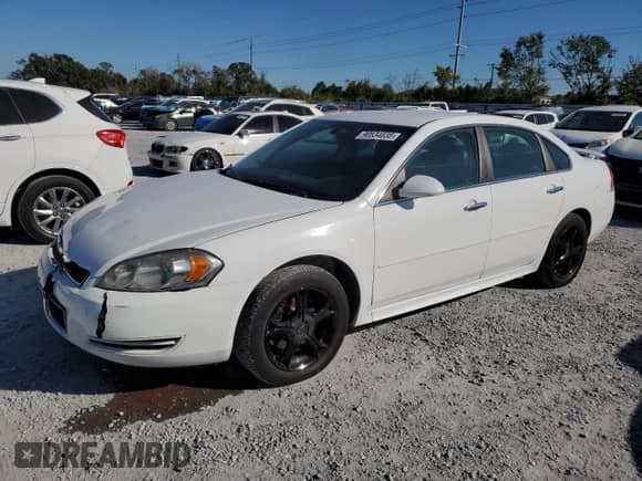 ✅ 2013 Chevrolet Impala LTZ • VIN: 2G1WC5E38D1215761 • Lot: 90534035. Listed on Copart with 205,467 mi. Free auction sales archive from the USA and detailed vehicle history report at DreamBid. Image 1.
