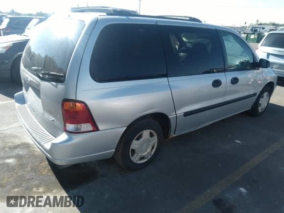 ✅ 2003 Ford Windstar LX • VIN: 2FMZA51463BB03392 • Lot: 35153915. Listed on IAAI with 246,046 mi. Free auction sales archive from the USA and detailed vehicle history report at DreamBid. Image 4.