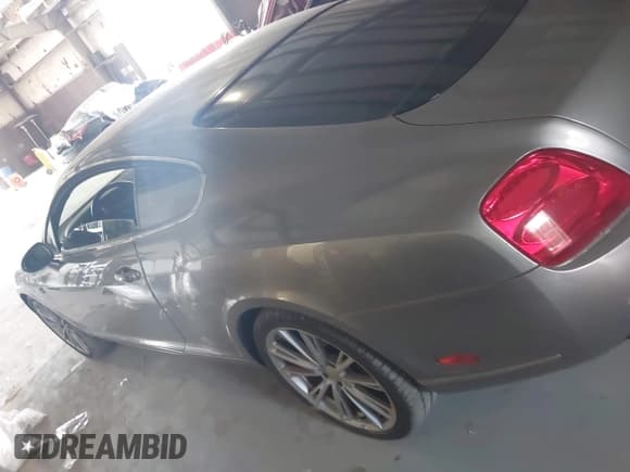 ✅ 2005 Bentley Continental GT GT • VIN: SCBCR63W55C025068 • Лот: 43204586. Опубликован ранее на IAAI с пробегом 60 453 миль. Бесплатный доступ к архиву аукционных продаж из США и подробный отчёт об истории автомобиля на DreamBid. Изображение 14.