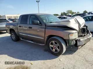 2010 Dodge Dakota Laramie с VIN 1D7RW5GP7AS203338, выставлен на аукционе Copart как лот 74550574 с пробегом 94 732 миль миль и Списание • Salvage title. История ставок и продаж доступна на DreamBid. Изображение 4.