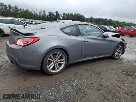 2010 Hyundai Genesis Coupe Track with VIN KMHHU6KH0AU031316, listed as a Copart auction lot 73744764 with 156,983 mi miles and Salvage title. Bid and sale history available at DreamBid. Image 3.