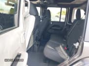 ✅ 2021 Jeep Wrangler Unlimited Sahara • VIN: 1C4HJXEN4MW503014 • Lot: 41900234. Listed on IAAI with 16,444 mi. Free auction sales archive from the USA and detailed vehicle history report at DreamBid. Image 8.