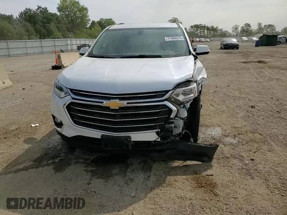 2018 Chevrolet Traverse LT Cloth z VIN 1GNERGKW2JJ234942, wystawiony jako Copart lot #71466575 z przebiegiem 95 646 mil mil oraz Szkoda całkowita • Salvage title. Historia ofert i sprzedaży dostępna na DreamBid. Obrazek 14.