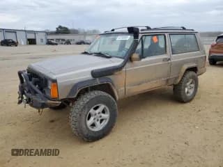 ✅ 1993 Jeep Cherokee Sport • VIN: 1J4FJ67S6PL580133 • Lot: 43230005. Listed on Copart with 122,173 mi. Free auction sales archive from the USA and detailed vehicle history report at DreamBid. Image 1.
