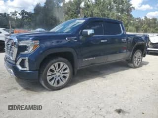 ✅ 2022 GMC Sierra 1500 Denali • VIN: 1GTU9FEL9NZ234346 • Лот: 83834945. Опубликован ранее на Copart с пробегом 28 542 миль. Бесплатный доступ к архиву аукционных продаж из США и подробный отчёт об истории автомобиля на DreamBid. Изображение 1.