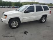 ✅ 2000 Jeep Grand Cherokee Limited • VIN: 1J4GW58N5YC174371 • Lot: 60941615. Listed on Copart with 179,399 mi. Free auction sales archive from the USA and detailed vehicle history report at DreamBid. Image 1.