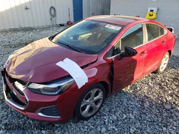 2019 Chevrolet Cruze Premier z VIN 1G1BF5SM5K7132730, wystawiony jako Copart lot #69477152 z przebiegiem 93 756 mil mil oraz . Historia ofert i sprzedaży dostępna na DreamBid. Obrazek 1.