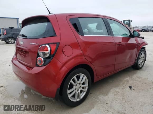 2013 Chevrolet Sonic LT с VIN 1G1JD6SH5D4130913, выставлен на аукционе Copart как лот 83786824 с пробегом 186 881 миль миль и Списание • Salvage title. История ставок и продаж доступна на DreamBid. Изображение 3.