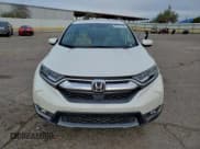 ✅ 2017 Honda CR-V Touring • VIN: 2HKRW2H96HH665391 • Lot: 94311795. Wystawiony na Copart z przebiegiem Nie podano. Bezpłatny archiwum sprzedaży aukcyjnych z USA i szczegółowy raport historii pojazdu na DreamBid. Zdjęcie 5.