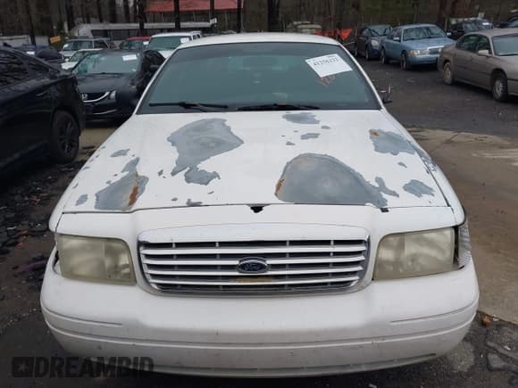 ✅ 2005 Ford Police Interceptor • VIN: 2FAFP71W75X120703 • Lot: 41256222. Listed on IAAI with 208,095 mi. Free auction sales archive from the USA and detailed vehicle history report at DreamBid. Image 12.