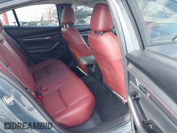 ✅ 2024 Mazda 3 S Carbon Edition • VIN: 3MZBPBCM9RM421270 • Lot: 43604481. Listed on IAAI with 23,354 mi. Free auction sales archive from the USA and detailed vehicle history report at DreamBid. Image 8.