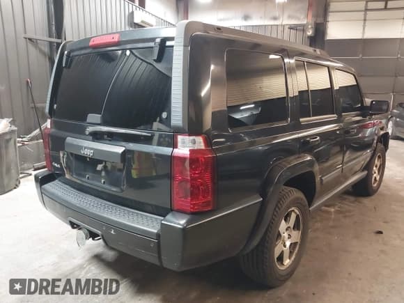 ✅ 2009 Jeep Commander Sport • VIN: 1J8HG48K09C547110 • Lot: 41768609. Listed on IAAI with 200,402 mi. Free auction sales archive from the USA and detailed vehicle history report at DreamBid. Image 4.