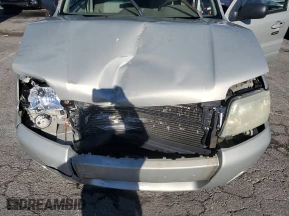 2006 Mercury Mariner Convenience с VIN 4M2YU56Z56DJ06515, выставлен на аукционе Copart как лот 87201835 с пробегом 292 936 миль миль и Списание • Salvage title. История ставок и продаж доступна на DreamBid. Изображение 11.