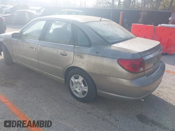 ✅ 2003 Saturn LS • VIN: 1G8JU54FX3Y556207 • Lot: 43731223. Listed on IAAI with 129,019 mi. Free auction sales archive from the USA and detailed vehicle history report at DreamBid. Image 3.