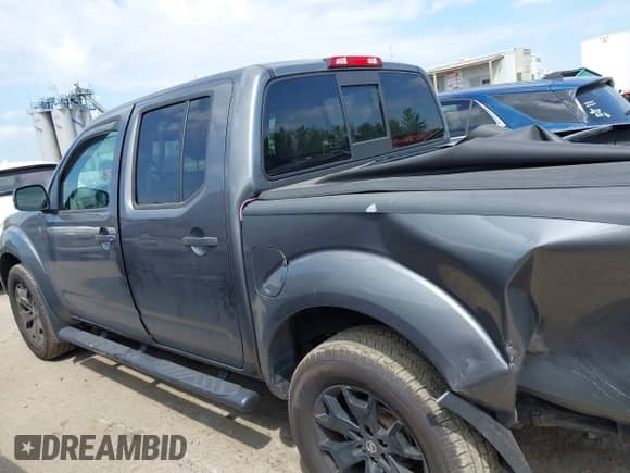 2020 Nissan Frontier SV with VIN 1N6ED0EB4LN726548, listed as a IAAI auction lot 42767637 with 64,100 mi miles and . Bid and sale history available at DreamBid. Image 14.