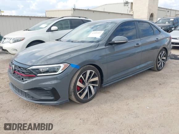 ✅ 2021 Volkswagen Jetta S • VIN: 3VW6T7BU9MM043990 • Лот: 43401422. Опубликован ранее на IAAI с пробегом 58 916 миль. Бесплатный доступ к архиву аукционных продаж из США и подробный отчёт об истории автомобиля на DreamBid. Изображение 2.