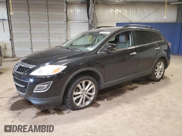 ✅ 2012 Mazda CX-9 Grand Touring • VIN: JM3TB3DV0C0365983 • Lot: 48670515. Wystawiony na Copart z przebiegiem 108 543 mil. Bezpłatny archiwum sprzedaży aukcyjnych z USA i szczegółowy raport historii pojazdu na DreamBid. Zdjęcie 1.