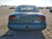 ✅ 1997 Ford Contour • VIN: 3FALP6536VM113346 • Лот: 70036024. Опубликован ранее на Copart с пробегом 115 084 миль. Бесплатный доступ к архиву аукционных продаж из США и подробный отчёт об истории автомобиля на DreamBid. Изображение 6.