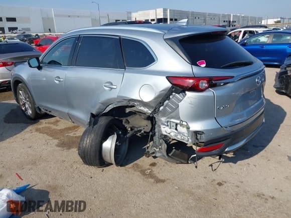 ✅ 2020 Mazda CX-9 Grand Touring • VIN: JM3TCADY6L0414728 • Lot: 42912318. Listed on IAAI with 92,283 mi. Free auction sales archive from the USA and detailed vehicle history report at DreamBid. Image 3.