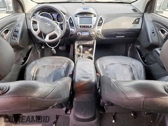 2013 Hyundai Tucson GLS with VIN KM8JU3AC7DU566198, listed as a Copart auction lot 71479605 with 196,474 mi miles and Salvage title. Bid and sale history available at DreamBid. Image 8.