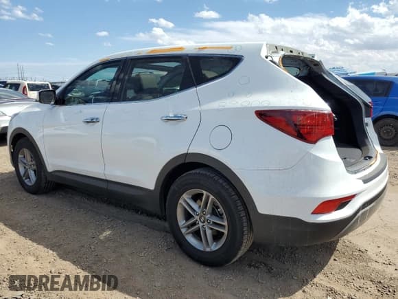 ✅ 2018 Hyundai Santa Fe 2.4L • VIN: 5NMZU3LB0JH063305 • Лот: 67851313. Опубликован ранее на Copart с пробегом 35 248 миль. Бесплатный доступ к архиву аукционных продаж из США и подробный отчёт об истории автомобиля на DreamBid. Изображение 2.