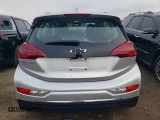 ✅ 2017 Chevrolet Bolt EV Premier • VIN: 1G1FX6S02H4167060 • Лот: 81644414. Опубликован ранее на Copart с пробегом 85 078 миль. Бесплатный доступ к архиву аукционных продаж из США и подробный отчёт об истории автомобиля на DreamBid. Изображение 6.