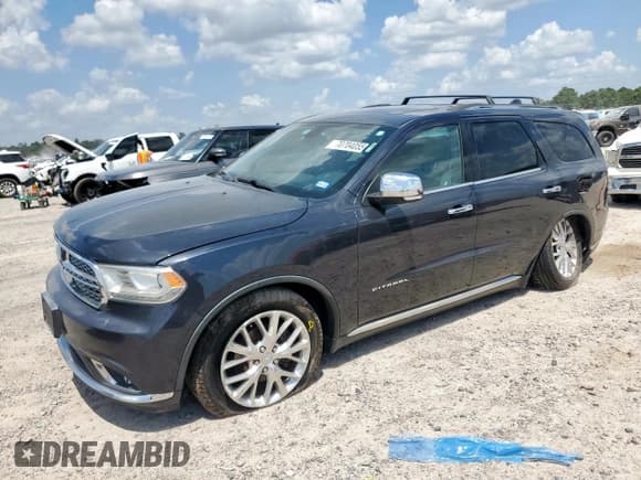 ✅ 2014 Dodge Durango Citadel • VIN: 1C4SDHET7EC975969 • Lot: 70704055. Listed on Copart with 159,802 mi. Free auction sales archive from the USA and detailed vehicle history report at DreamBid. Image 1.