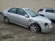 ✅ 2009 Kia Spectra EX • VIN: KNAFE222795027263 • Lot: 93812205. Listed on Copart with 164,002 mi. Free auction sales archive from the USA and detailed vehicle history report at DreamBid. Image 4.