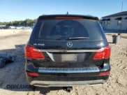 ✅ 2015 Mercedes-Benz GL 450 • VIN: 4JGDF6EE5FA481112 • Лот: 90360985. Опубликован ранее на Copart с пробегом 145 271 миль. Бесплатный доступ к архиву аукционных продаж из США и подробный отчёт об истории автомобиля на DreamBid. Изображение 6.