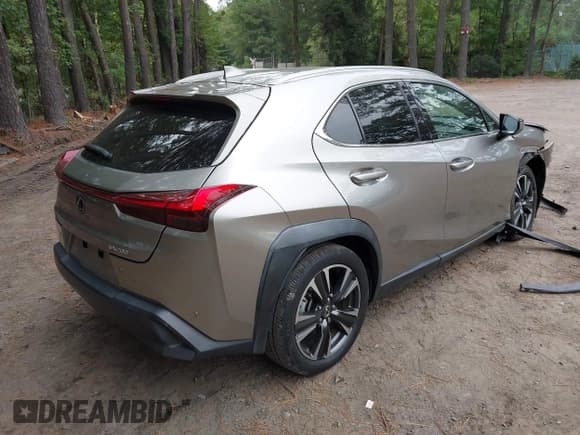 ✅ 2021 Lexus UX 200 • VIN: JTHX3JBH8M2036171 • Lot: 43351425. Listed on IAAI with 52,480 mi. Free auction sales archive from the USA and detailed vehicle history report at DreamBid. Image 4.