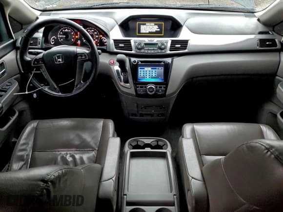 ✅ 2014 Honda Odyssey EX-L • VIN: 5FNRL5H61EB129538 • Lot: 94267145. Listed on Copart with 185,108 mi. Free auction sales archive from the USA and detailed vehicle history report at DreamBid. Image 8.