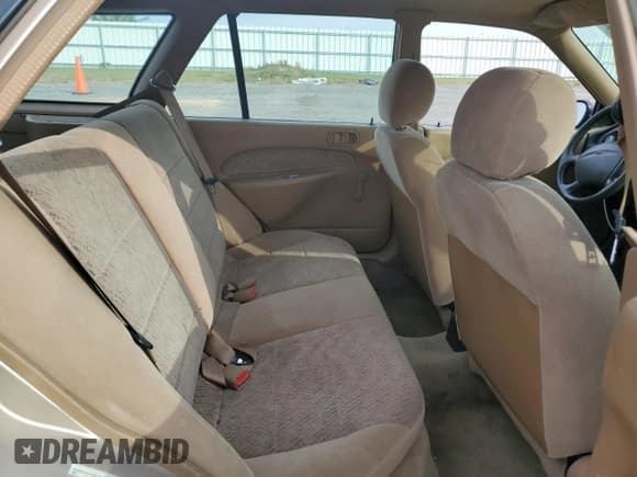 ✅ 1997 Ford Escort LX • VIN: 3FALP15P1VR154749 • Лот: 76805764. Опубликован ранее на Copart с пробегом 259 405 миль. Бесплатный доступ к архиву аукционных продаж из США и подробный отчёт об истории автомобиля на DreamBid. Изображение 10.