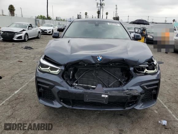 ✅ 2022 BMW X6 xDrive40i • VIN: 5UXCY6C07N9M65218 • Лот: 63720523. Опубликован ранее на Copart с пробегом 14 702 миль. Бесплатный доступ к архиву аукционных продаж из США и подробный отчёт об истории автомобиля на DreamBid. Изображение 5.