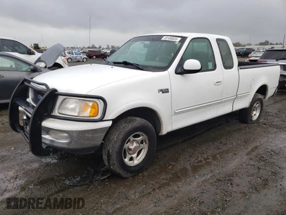 ✅ 1997 Ford F-150 • VIN: 2FTEX18L6VCA28603 • Lot: 49100835. Wystawiony na Copart z przebiegiem 127 510 mil. Bezpłatny archiwum sprzedaży aukcyjnych z USA i szczegółowy raport historii pojazdu na DreamBid. Zdjęcie 1.