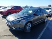 ✅ 2017 Ford Fusion Hybrid SE • VIN: 3FA6P0LU8HR260068 • Lot: 43685195. Listed on IAAI with 211,056 mi. Free auction sales archive from the USA and detailed vehicle history report at DreamBid. Image 2.