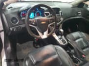 ✅ 2014 Chevrolet Cruze LTZ • VIN: 1G1PG5SB5E7203818 • Lot: 83825085. Listed on Copart with 94,394 mi. Free auction sales archive from the USA and detailed vehicle history report at DreamBid. Image 8.