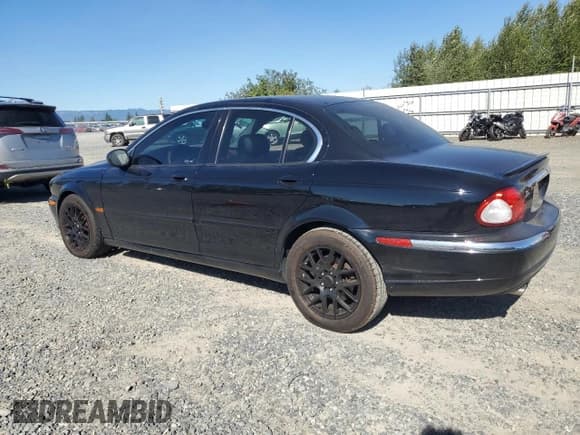 ✅ 2003 Jaguar X-Type 2.5L Manual • VIN: SAJEA51D83XD11290 • Лот: 64768505. Опубликован ранее на Copart с пробегом 126 635 миль. Бесплатный доступ к архиву аукционных продаж из США и подробный отчёт об истории автомобиля на DreamBid. Изображение 2.