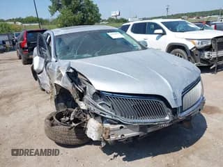✅ 2015 Lincoln MKS • VIN: 1LNHL9DK8FG608211 • Lot: 43154019. Listed on IAAI with 152,341 mi. Free auction sales archive from the USA and detailed vehicle history report at DreamBid. Image 1.