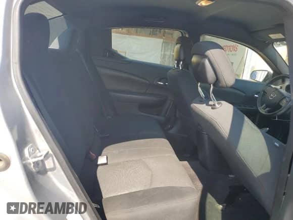 2014 Dodge Avenger SE with VIN 1C3CDZAB3EN168672, listed as a Copart auction lot 68719285 with 128,915 mi miles and Salvage title. Bid and sale history available at DreamBid. Image 10.