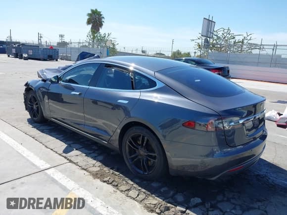 ✅ 2015 Tesla Model S 85 • VIN: 5YJSA1E18FF104436 • Lot: 42686314. Listed on IAAI with 179,459 mi. Free auction sales archive from the USA and detailed vehicle history report at DreamBid. Image 3.