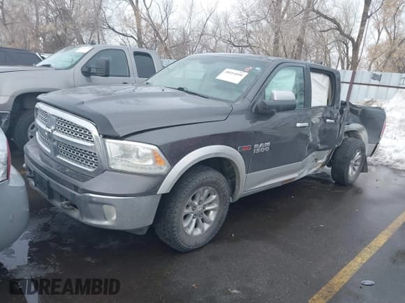 ✅ 2016 Ram 1500 Laramie • VIN: 1C6RR7NM8GS158013 • Лот: 38554090. Опубликован ранее на IAAI с пробегом 276 455 миль. Бесплатный доступ к архиву аукционных продаж из США и подробный отчёт об истории автомобиля на DreamBid. Изображение 2.