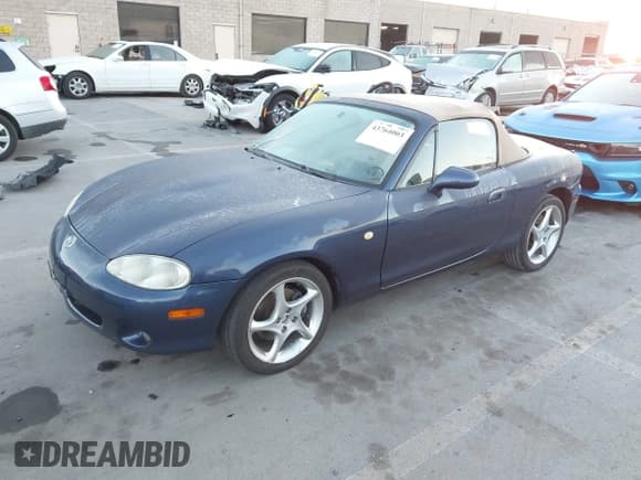 ✅ 2001 Mazda MX-5 Miata • VIN: JM1NB353610206770 • Lot: 43764003. Listed on IAAI with 84,041 mi. Free auction sales archive from the USA and detailed vehicle history report at DreamBid. Image 2.