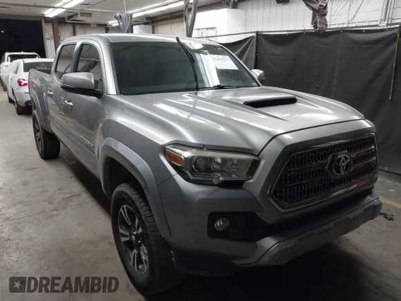 ✅ 2016 Toyota Tacoma TRD Sport • VIN: 3TMBZ5DN2GM003989 • Lot: 43455257. Wystawiony na IAAI z przebiegiem 145 308 mil. Bezpłatny archiwum sprzedaży aukcyjnych z USA i szczegółowy raport historii pojazdu na DreamBid. Zdjęcie 1.