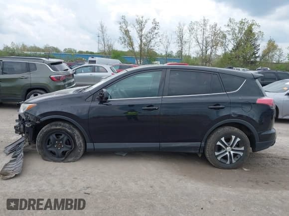 ✅ 2018 Toyota RAV4 LE • VIN: 2T3BFREVXJW763690 • Lot: 42171331. Listed on IAAI with 133,428 mi. Free auction sales archive from the USA and detailed vehicle history report at DreamBid. Image 14.